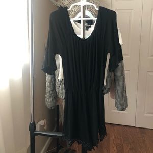 cute black romper with lace trim at the bottom